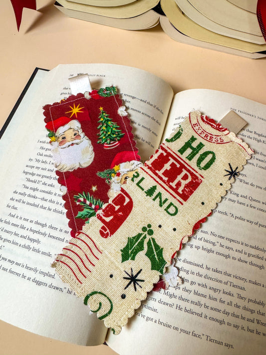 Decorative Christmas bookmarks on an open book