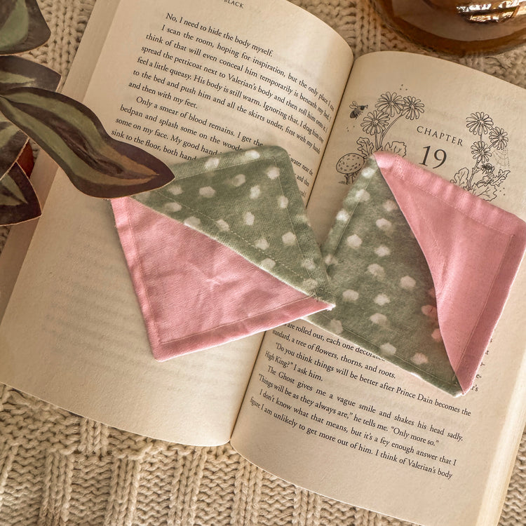 Set of 2 Pink and Green Polka Dot Corner Bookmarks on a cozy blanket and book