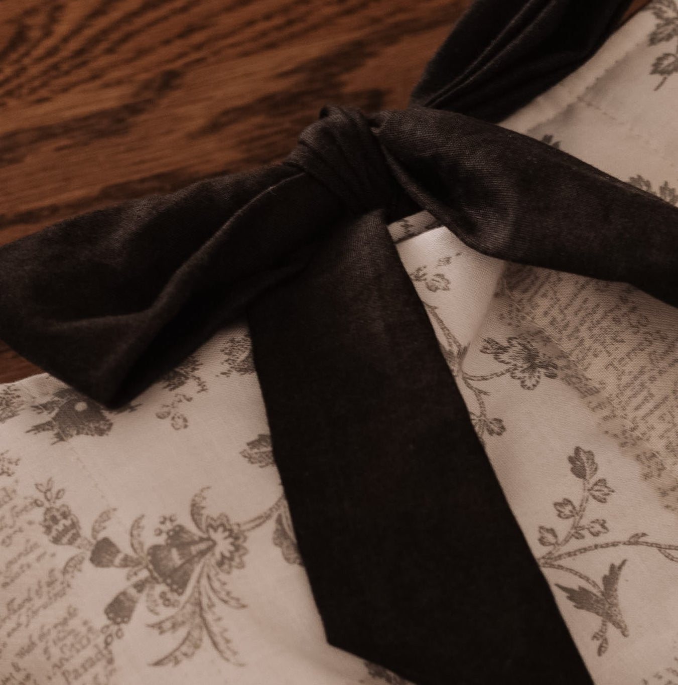 The Marginalia Book Sleeve with Bow | Handmade Padded Book