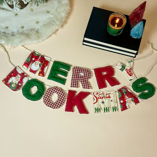 Christmas-themed decorative banner with 'Merry Christmas' text on a neutral background.