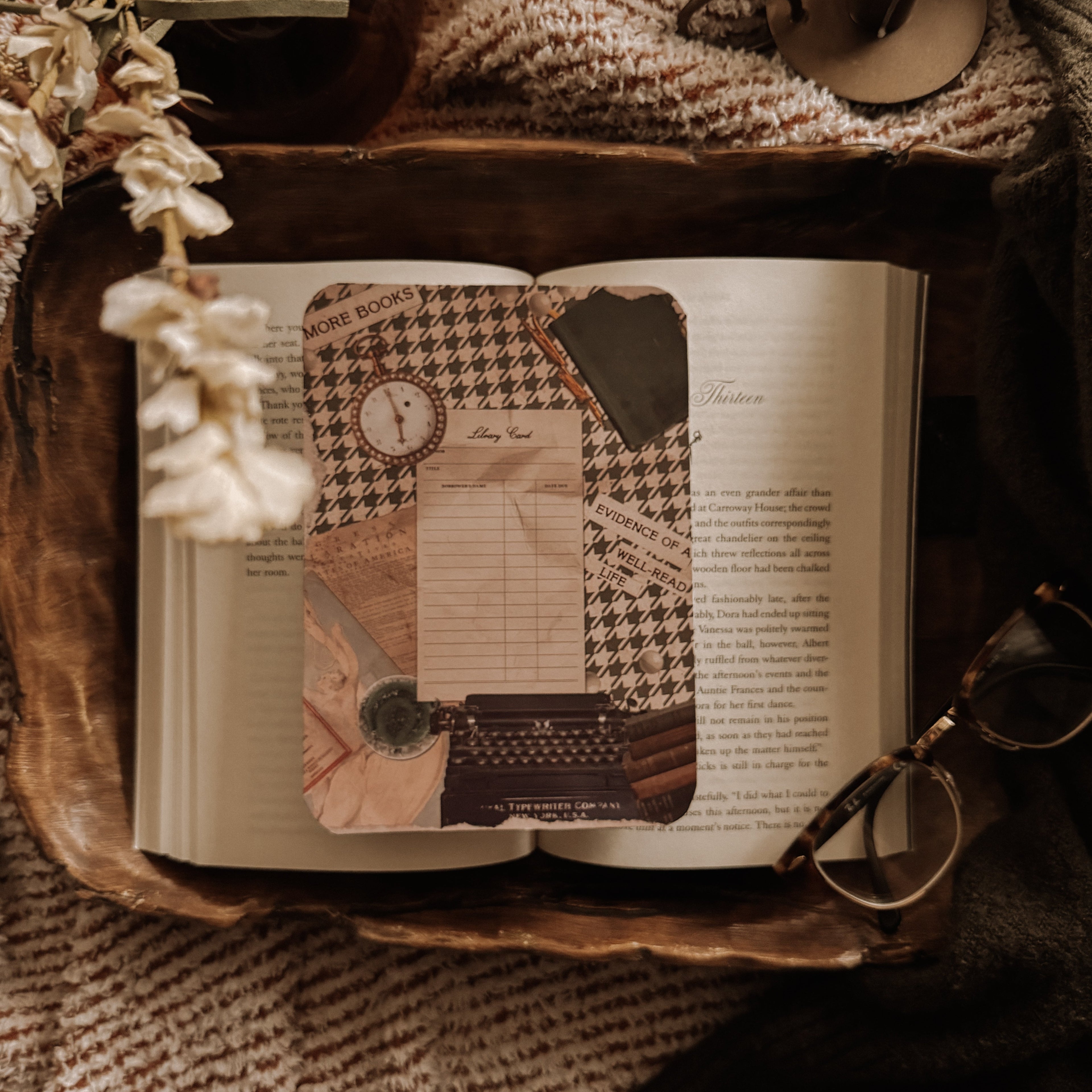 Dark Academia Kindle insert featuring a vintage typewriter, antique clock, and layered paper collage on a moody, textured background with a candle.