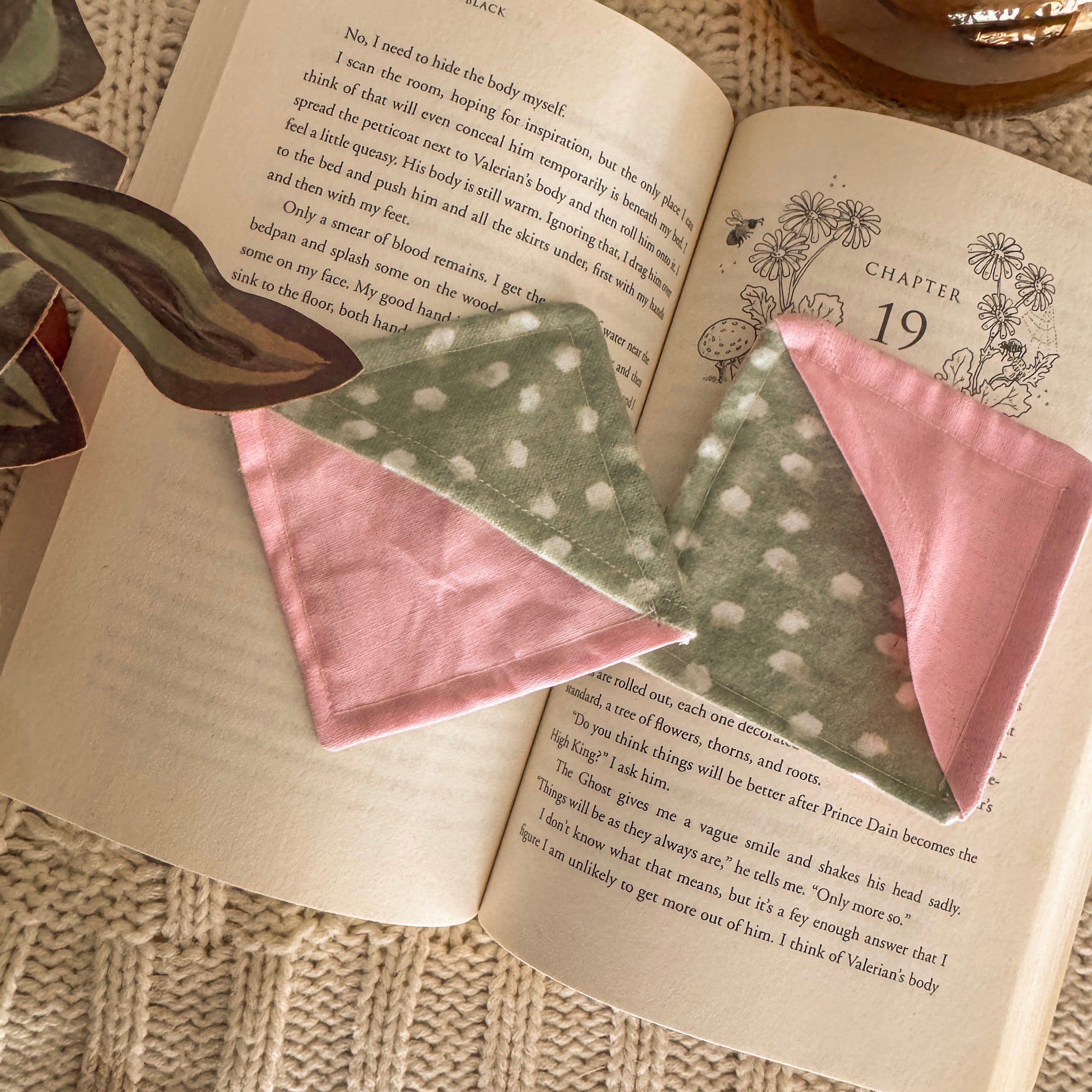 Set of 2 Pink and Green Polka Dot Corner Bookmarks on a cozy blanket and book