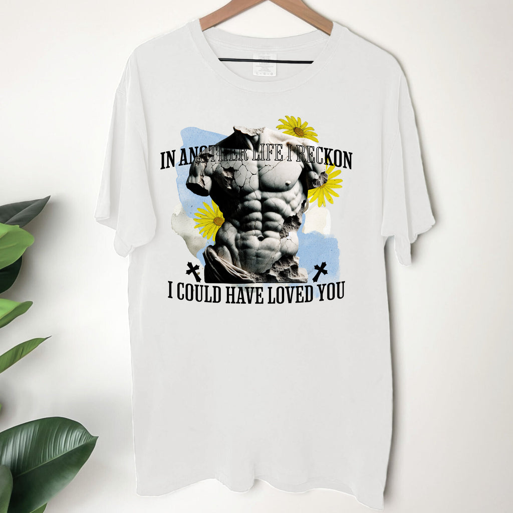 Bookish tee with subtle literary design and cozy styling.