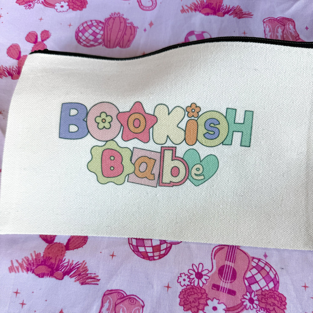 Canvas pouch with Bookish Babe text in block letters lying flat