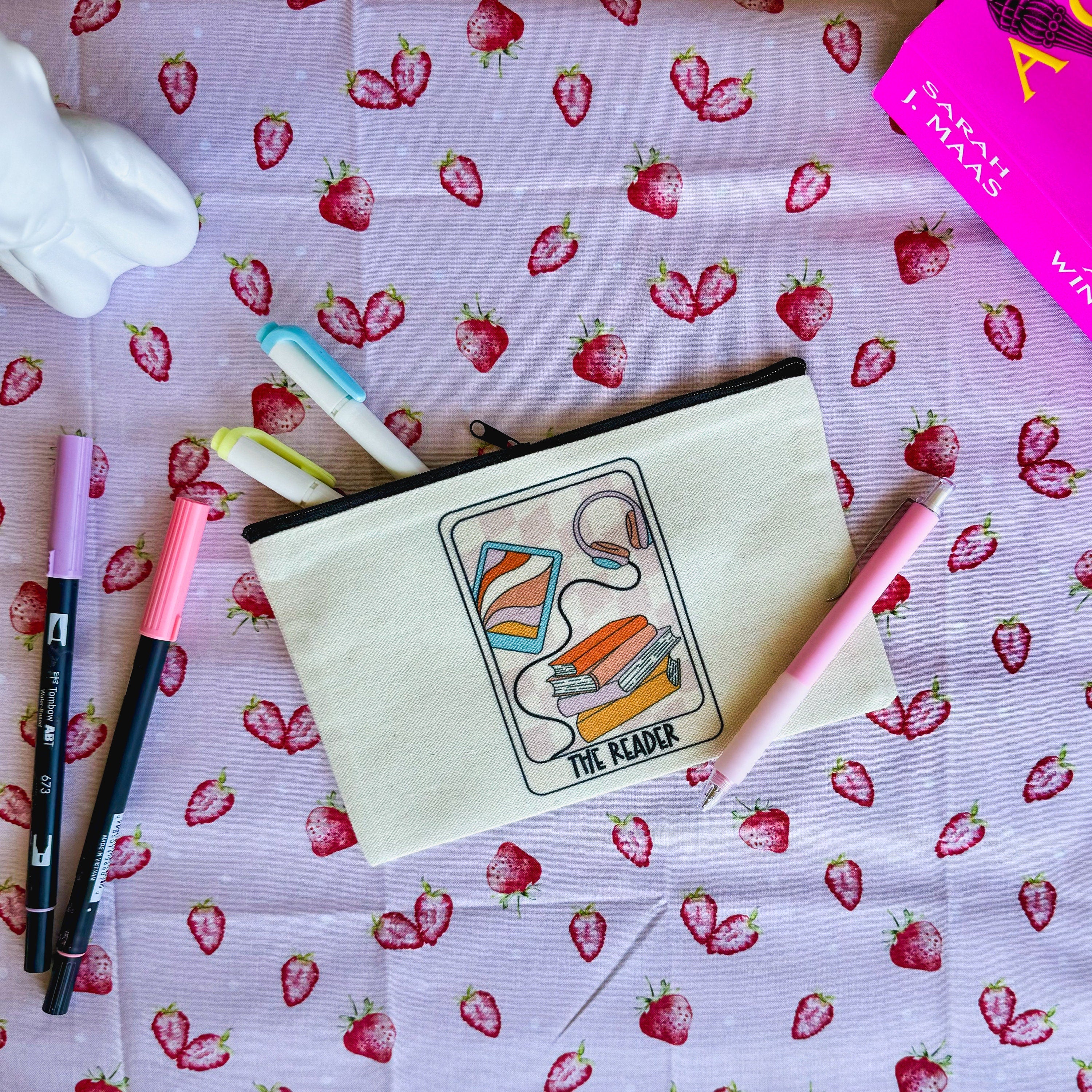 The Reader tarot zipper pouch showing mystical bookish design