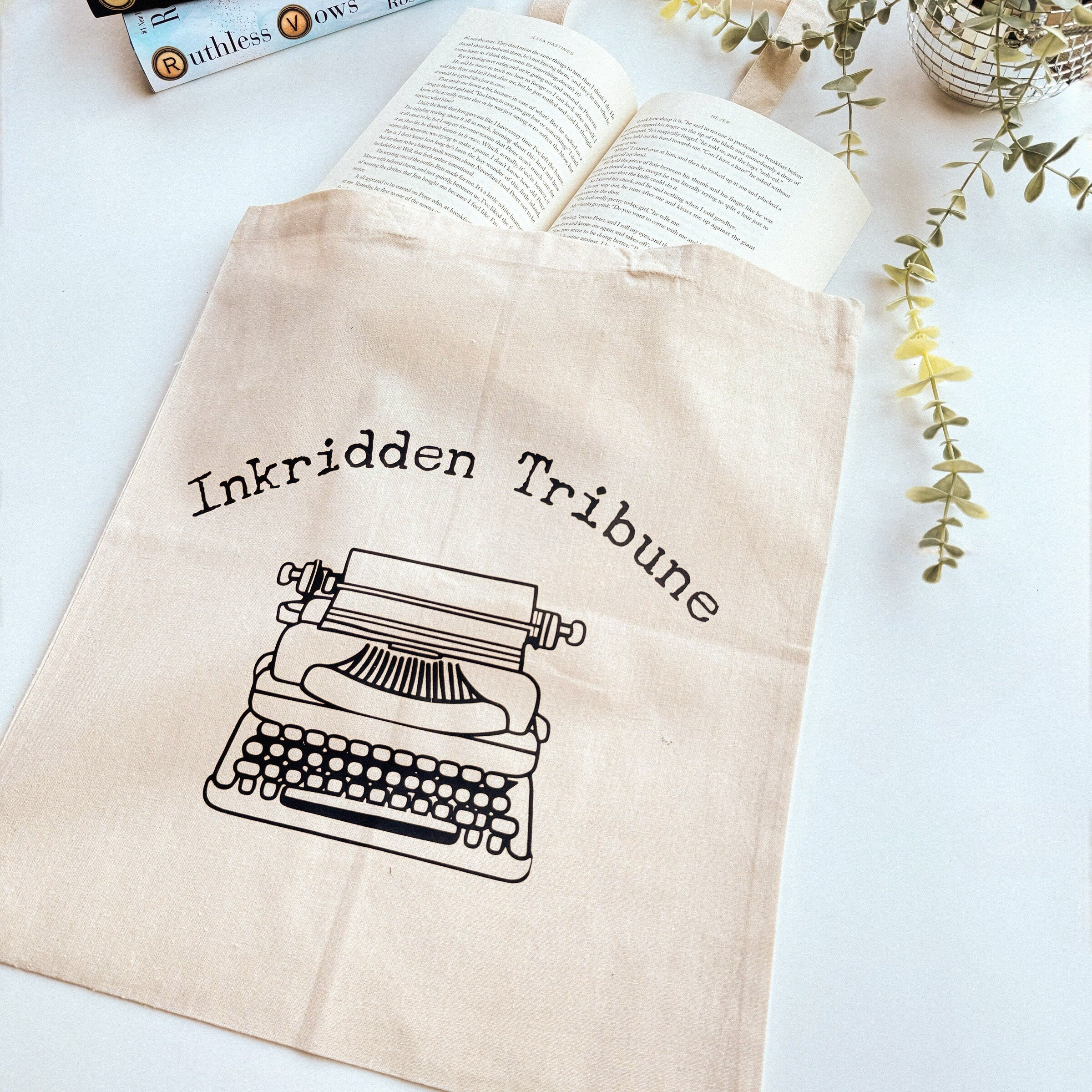 Divine Rivals canvas tote bag with Inkridden Tribune newspaper design