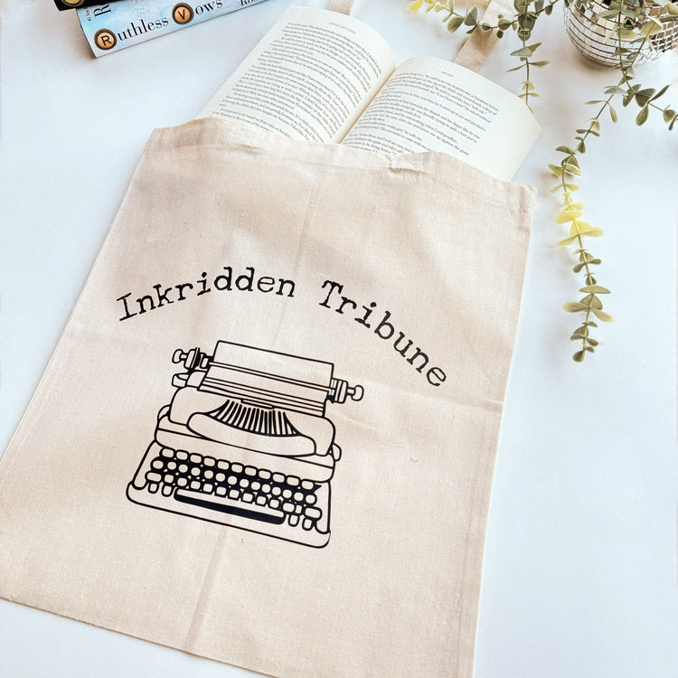 Divine Rivals canvas tote bag with Inkridden Tribune newspaper design