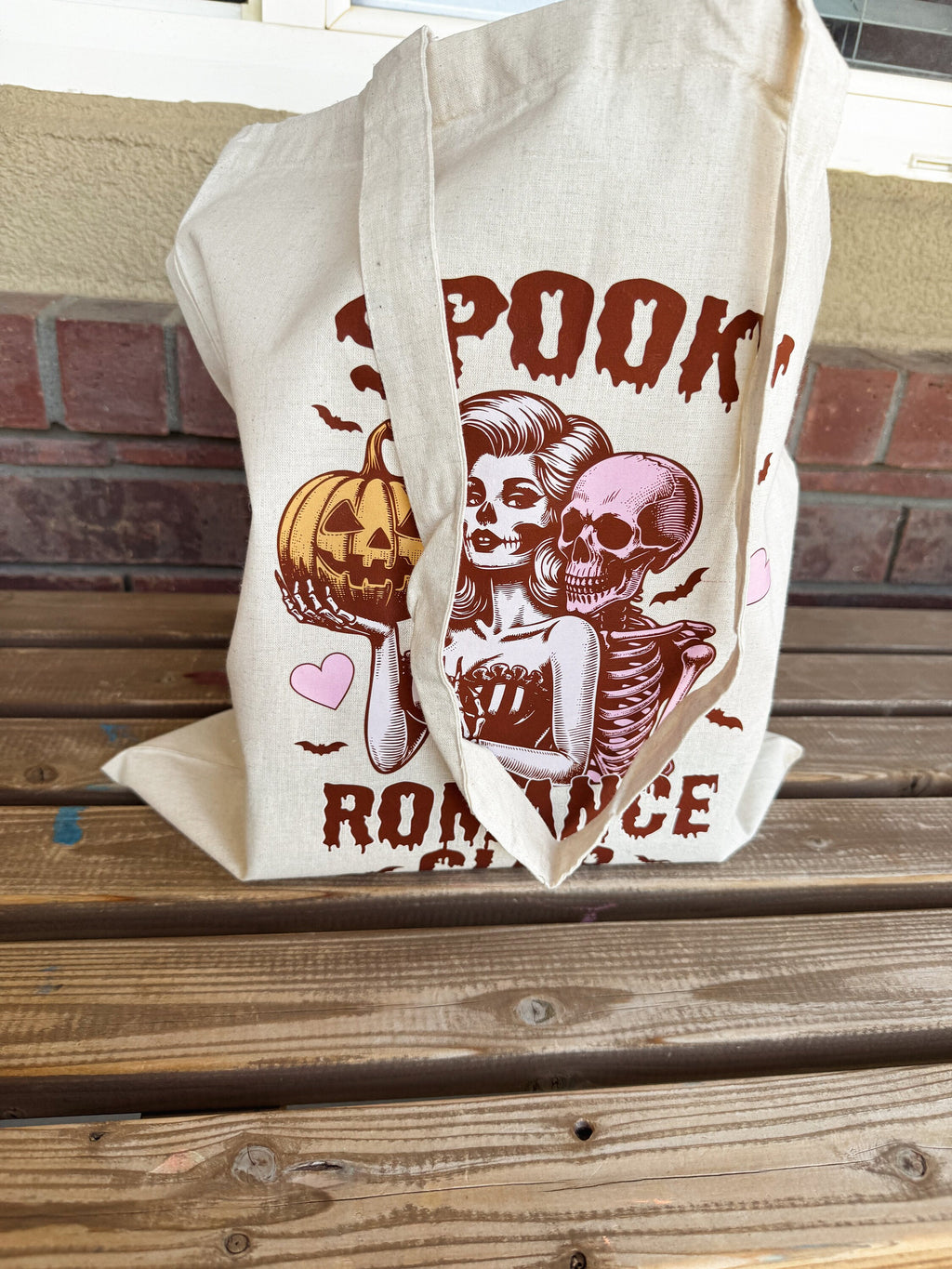 Vintage spooky romance tote bag with fall aesthetic design
