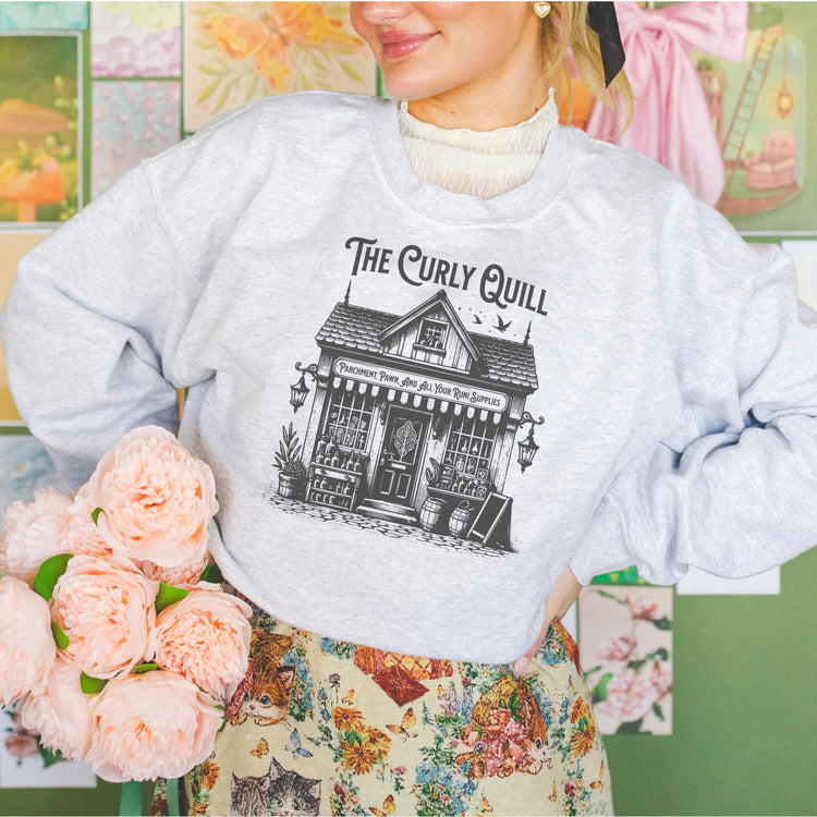 A model wearing a bookish sweatshirt styled for a cozy reading moment.