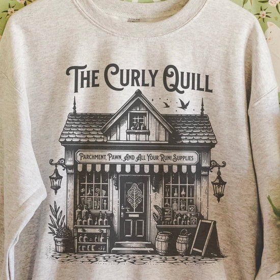 Close-up of soft sweatshirt showing faded graphic and cozy fabric texture.