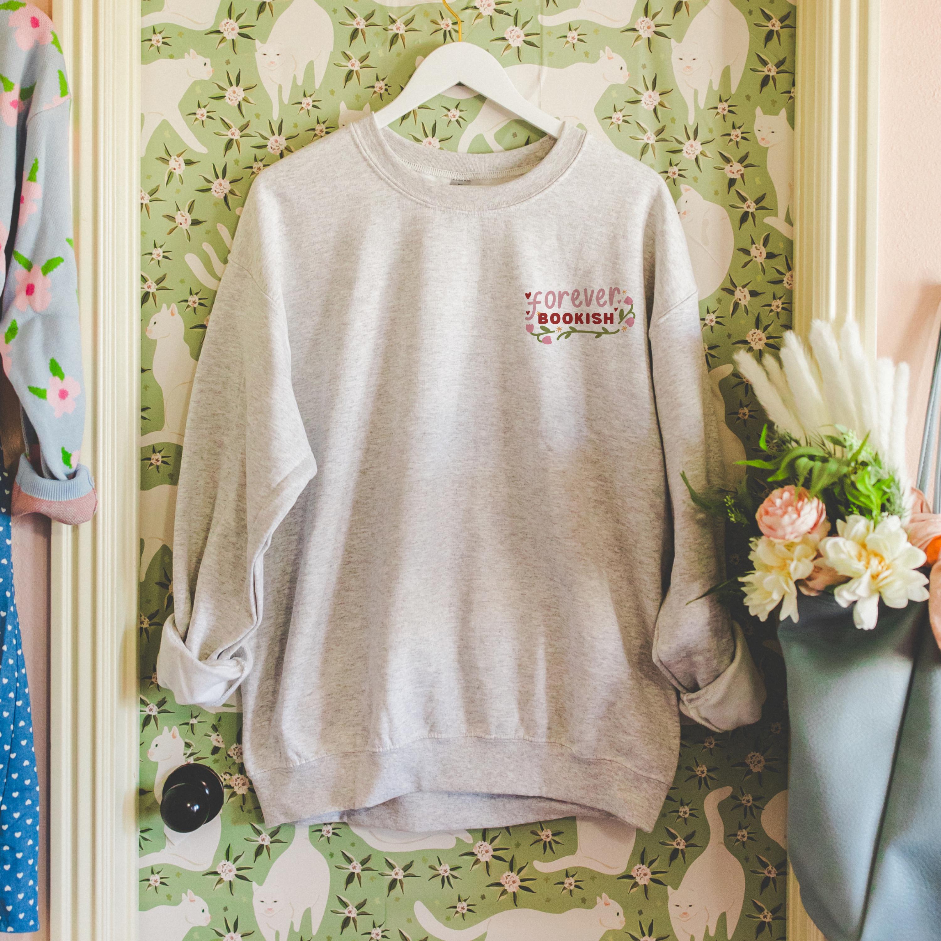 Close-up of Forever Bookish sweatshirt showing cozy soft texture and relaxed fit.