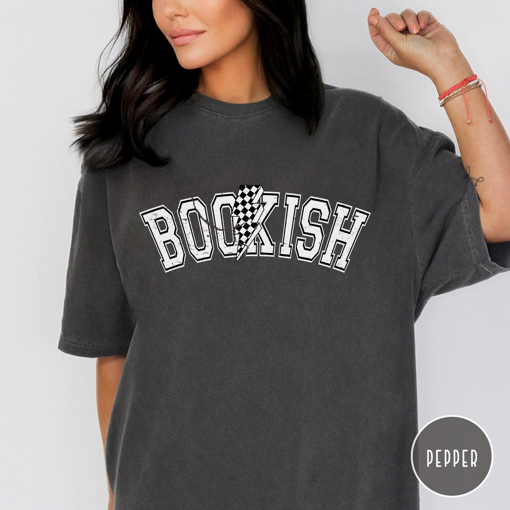 Close-up of vintage collegiate font and checkered lightning bolt design.